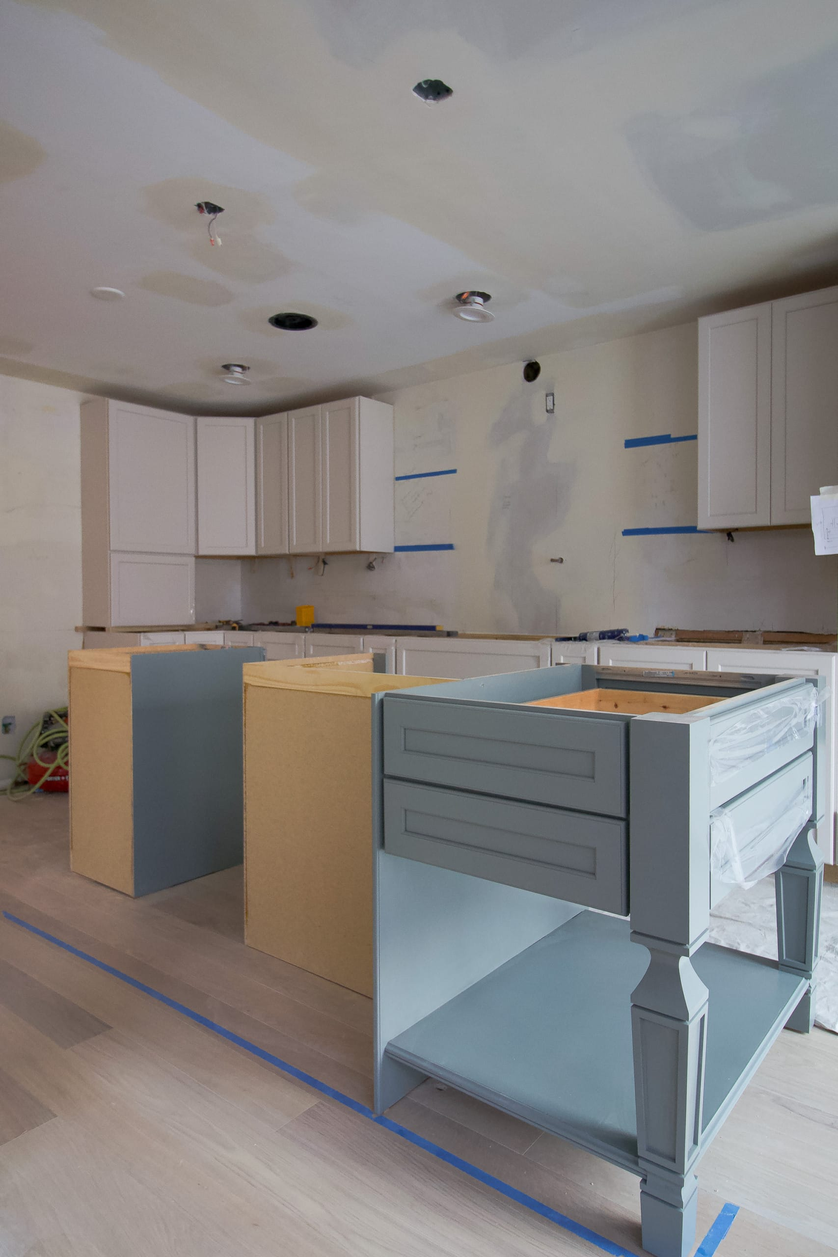 Flooring Repair + Countertop & Cabinet Installations